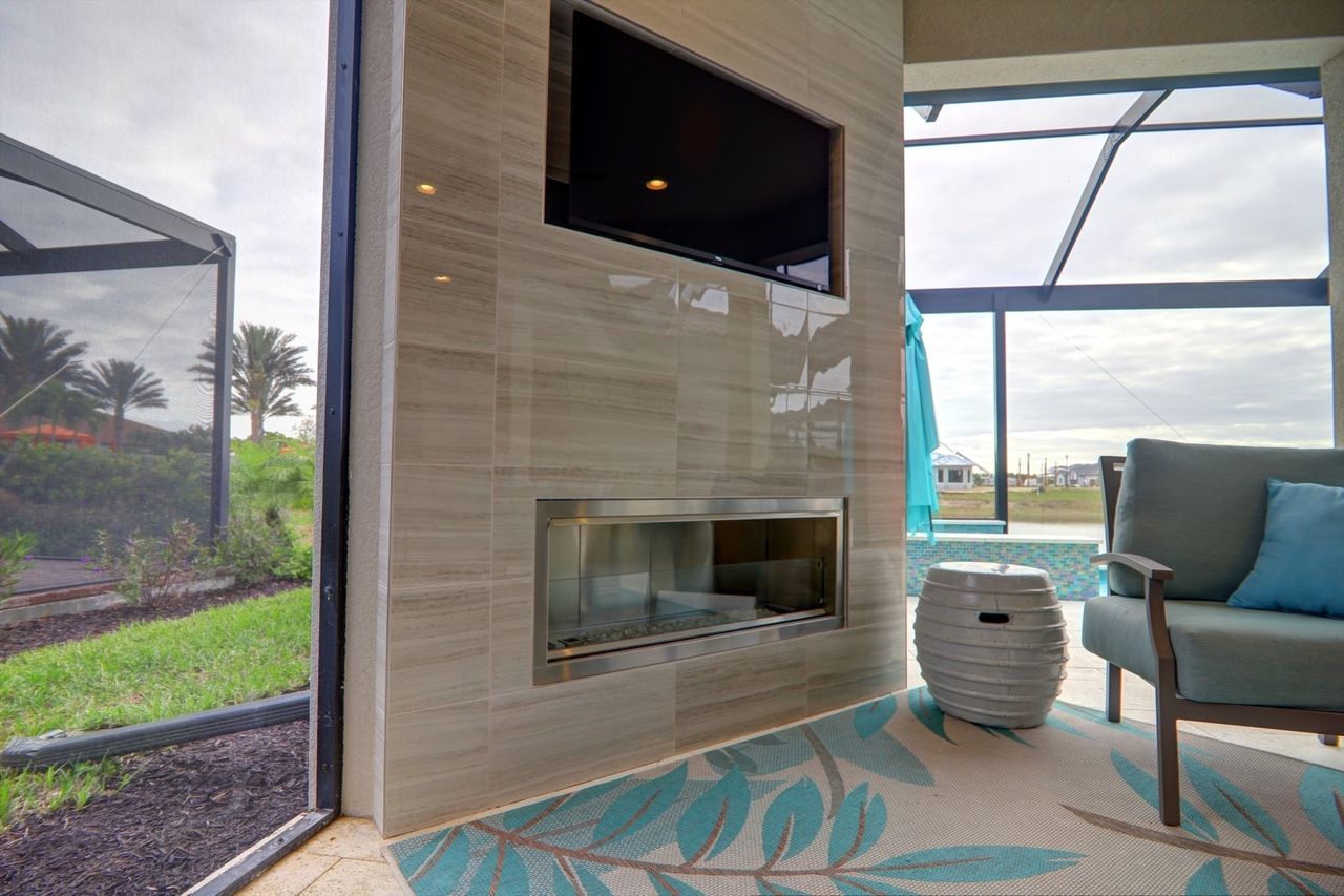 porcelain tile tv feature wall with linear gas fireplace naples, fl