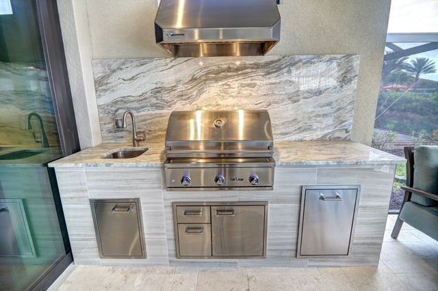 outdoor kitchen with grill sink and venthood naples, fl