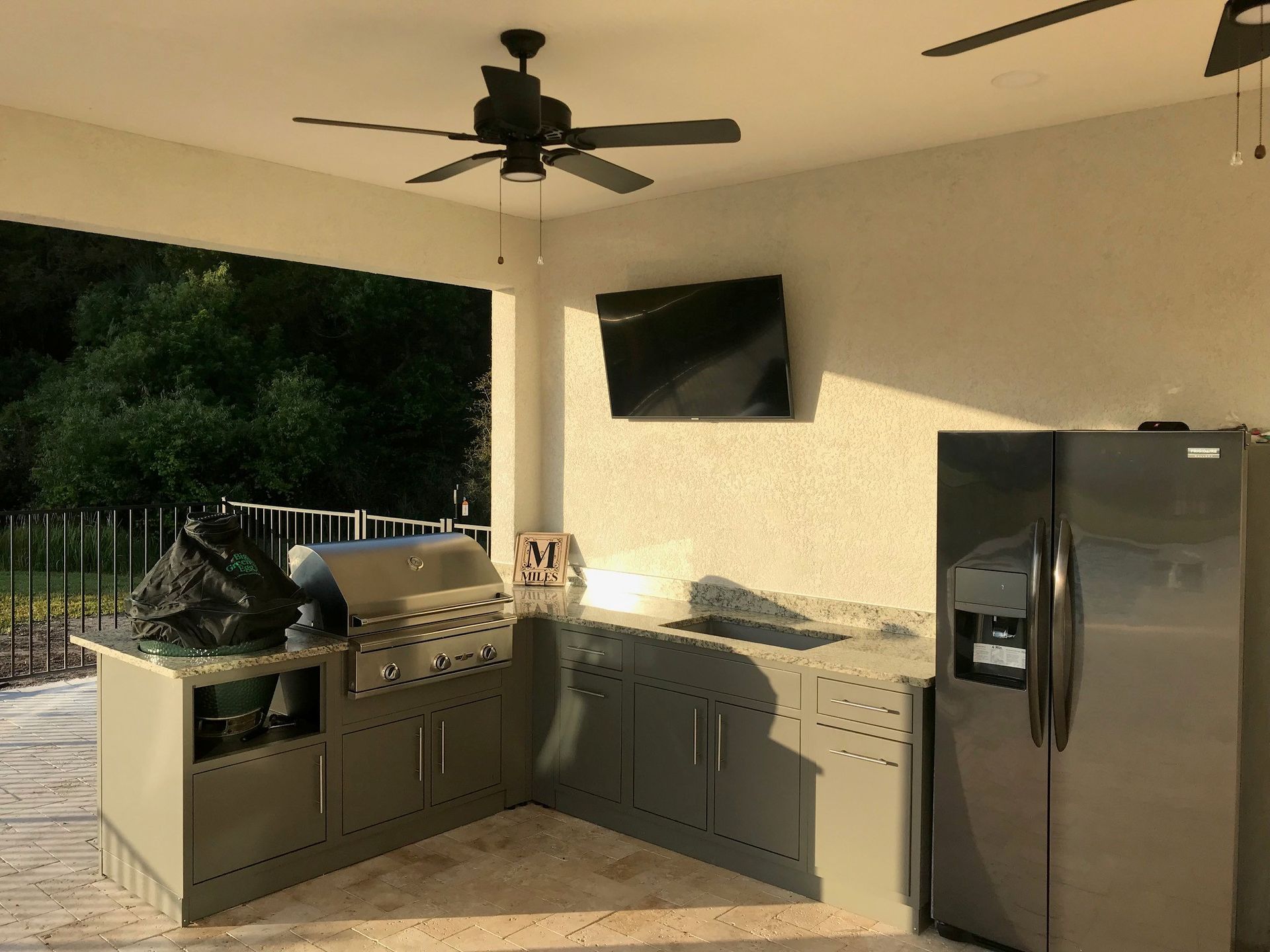 Challenger Designs L-shaped custom outdoor kitchen textured grey glimmer with standard doors