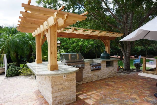 cedar trellis with big green egg outdoor kitchen Fort Myers FL