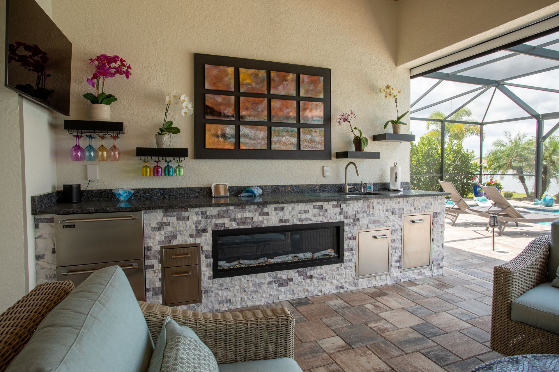 Custom Outdoor Kitchen Fireplace Stacked Stone  Estero, FL