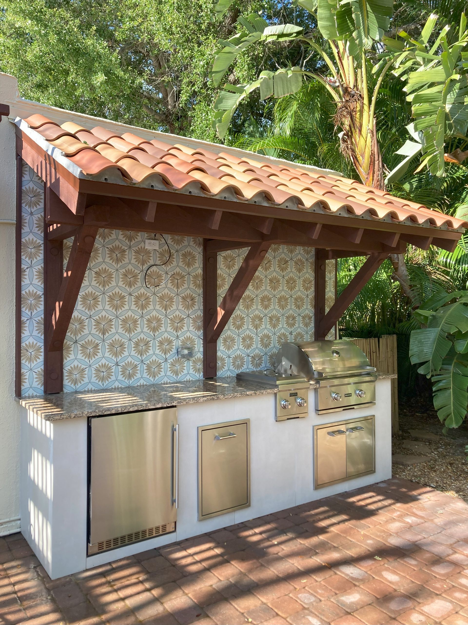 outdoor kitchen with trellis roof fort myers, fl