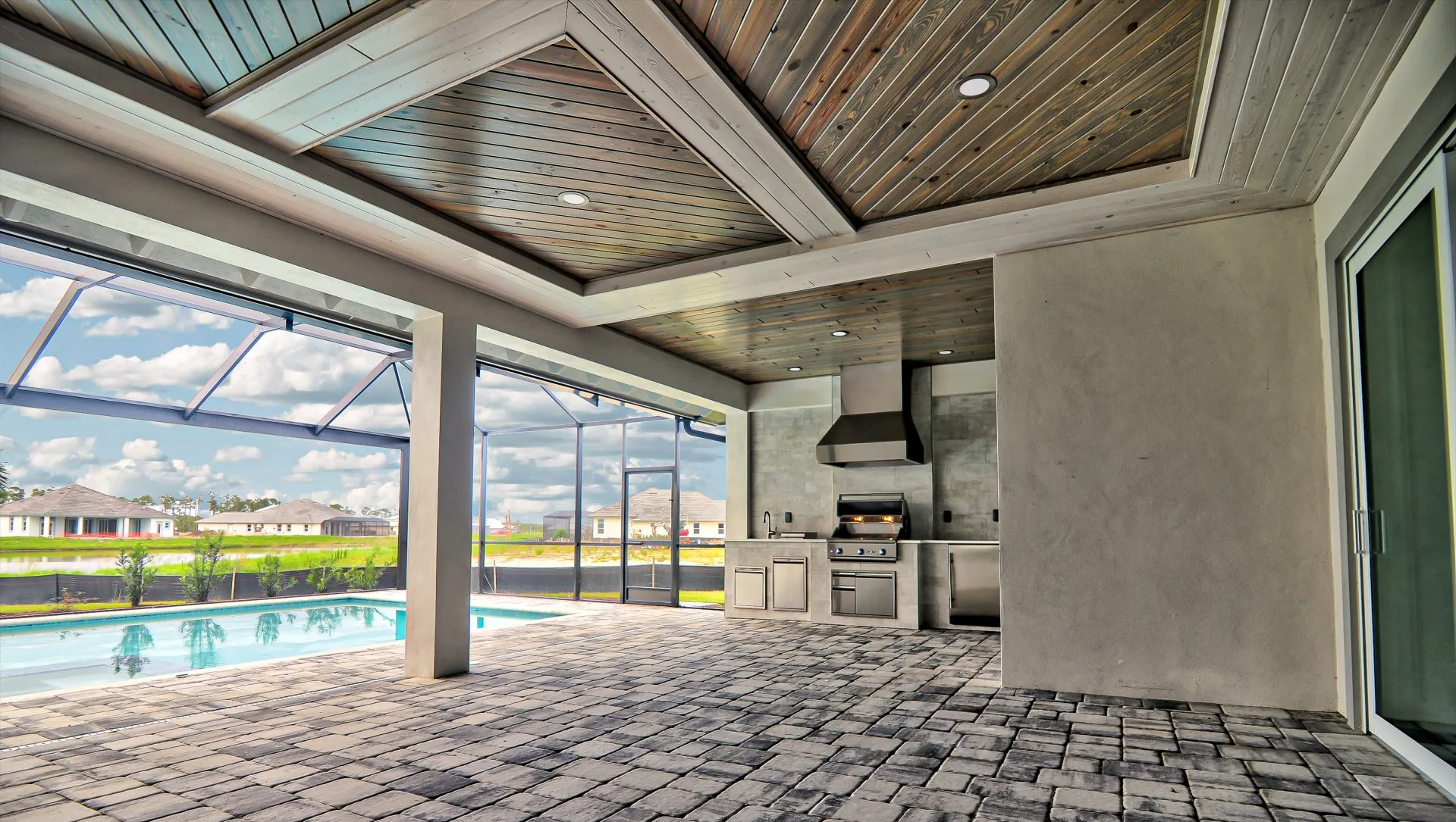 Custom wood ceiling and outdoor kitchen
