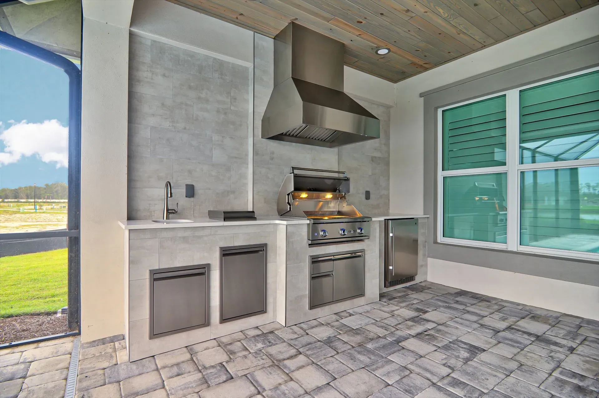 Porcelain tile outdoor kitchen cabinet finish Naples FL