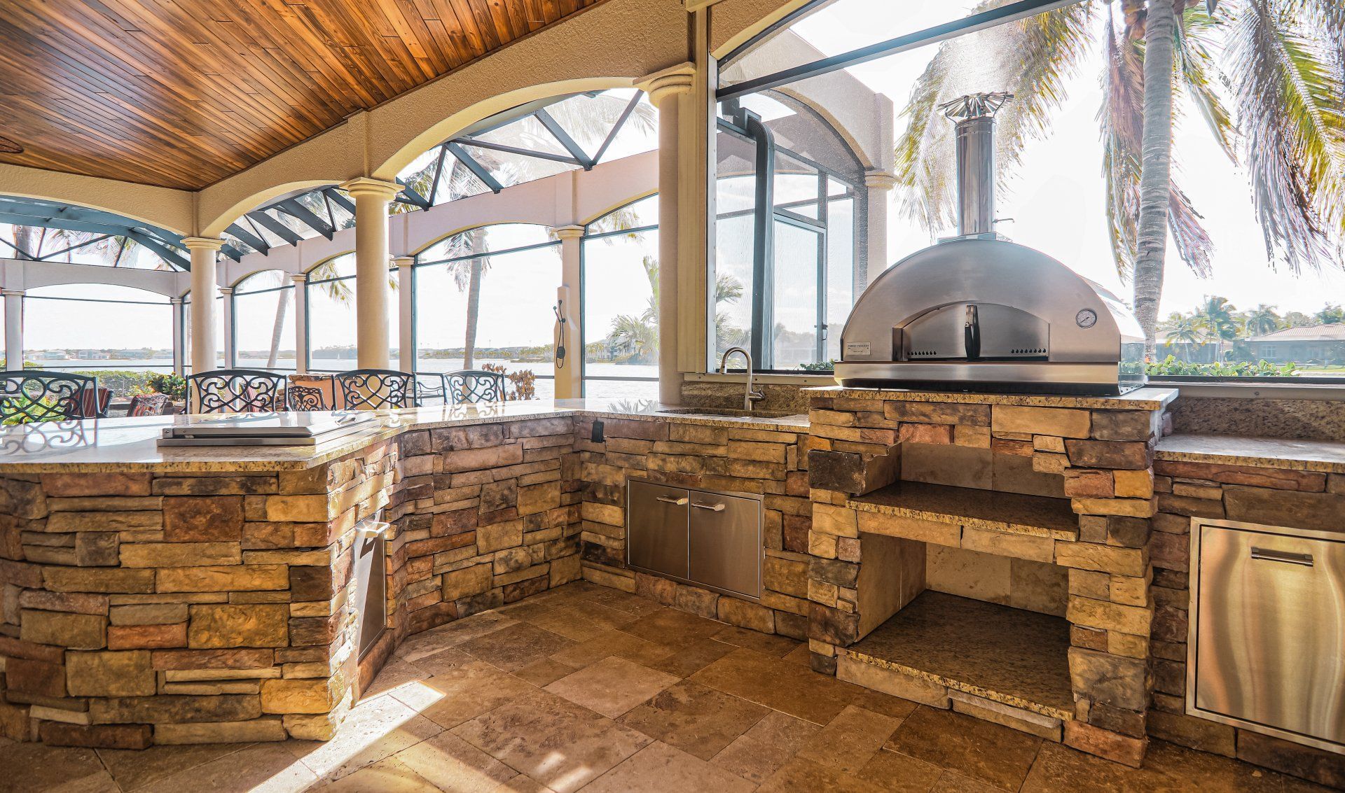 cultured stone outdoor kitchen with pizza oven fort myers fl