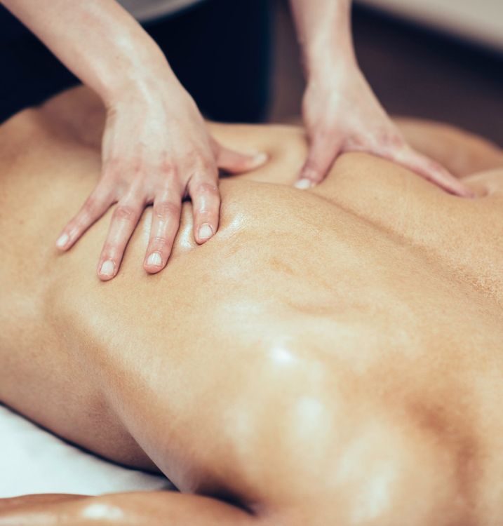 Doing Massage On Woman Body — 360 Muscle Therapy in Bolwarra Heights, NSW