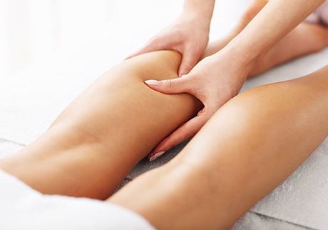 Woman Having Leg Therapy — 360 Muscle Therapy in Bolwarra Heights, NSW