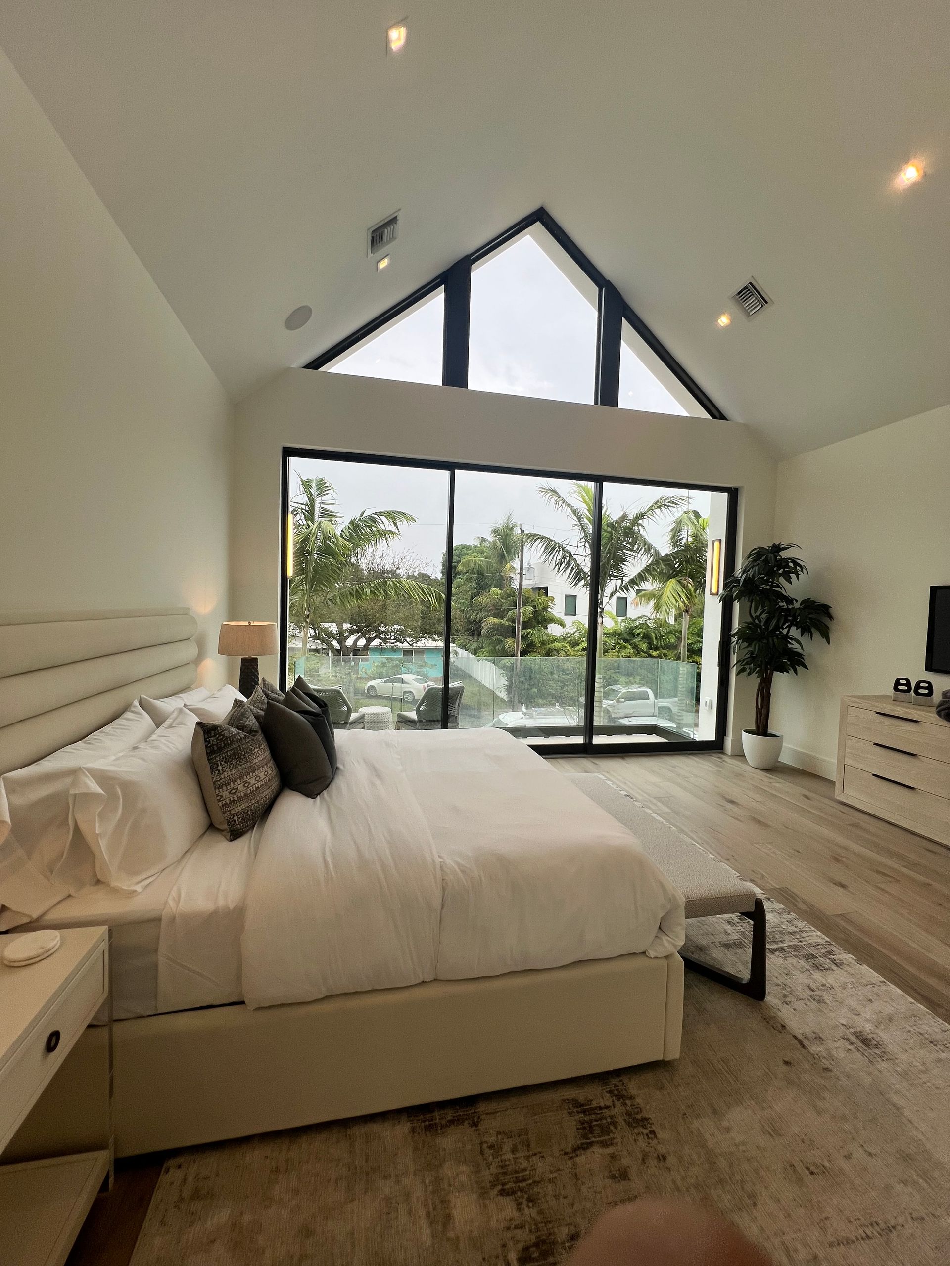 a person is applying window tinting to a car window .