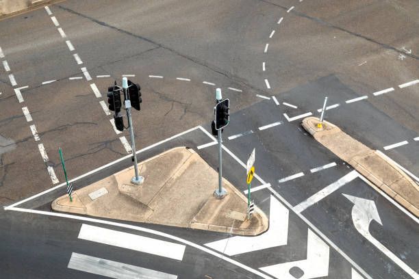 An Aerial View Of An Empty Intersection With A White Arrow Pointing To The Right - NSW - Midwest Traffic Management