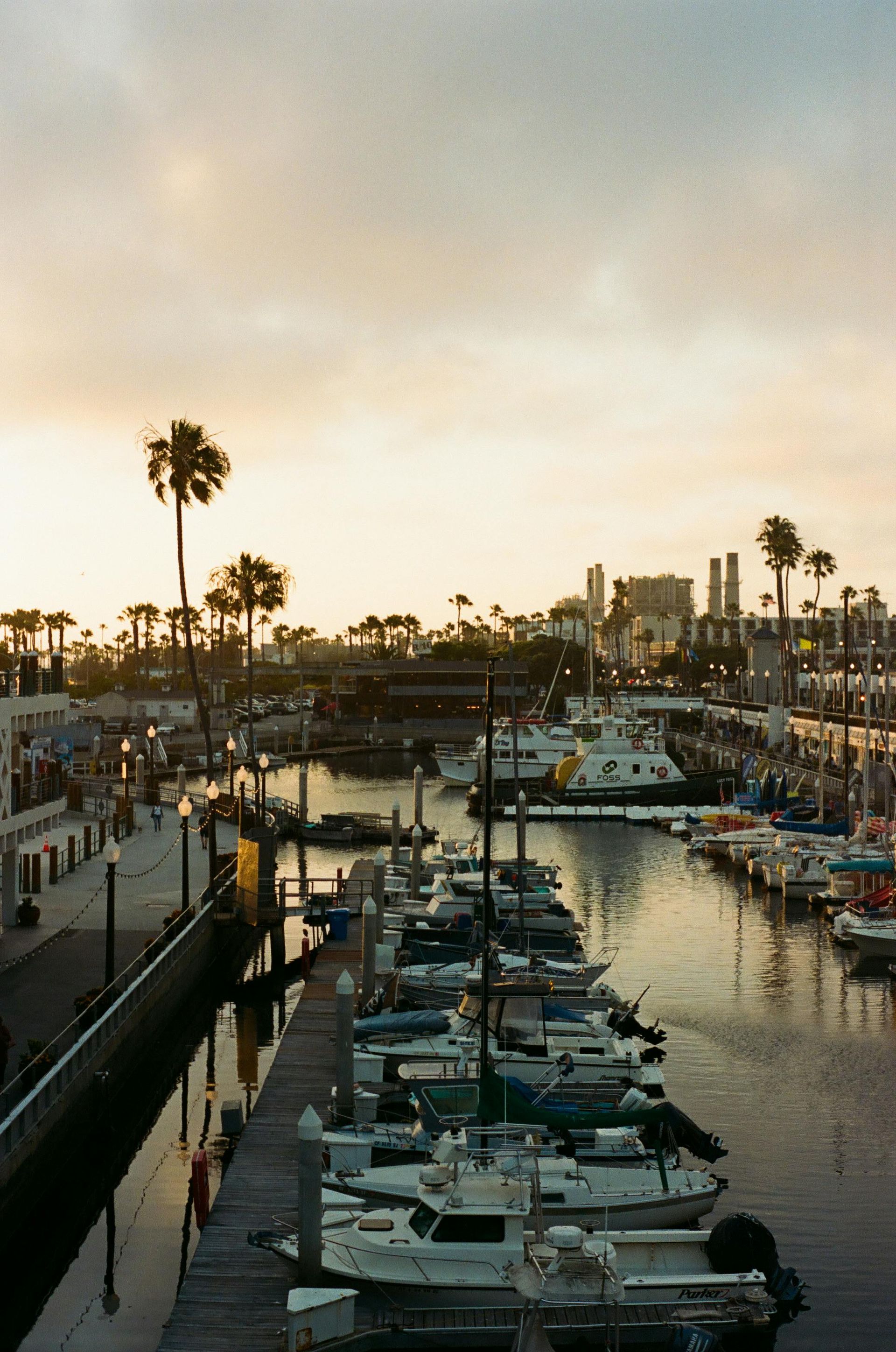 An aerial view of a city skyline at sunset.