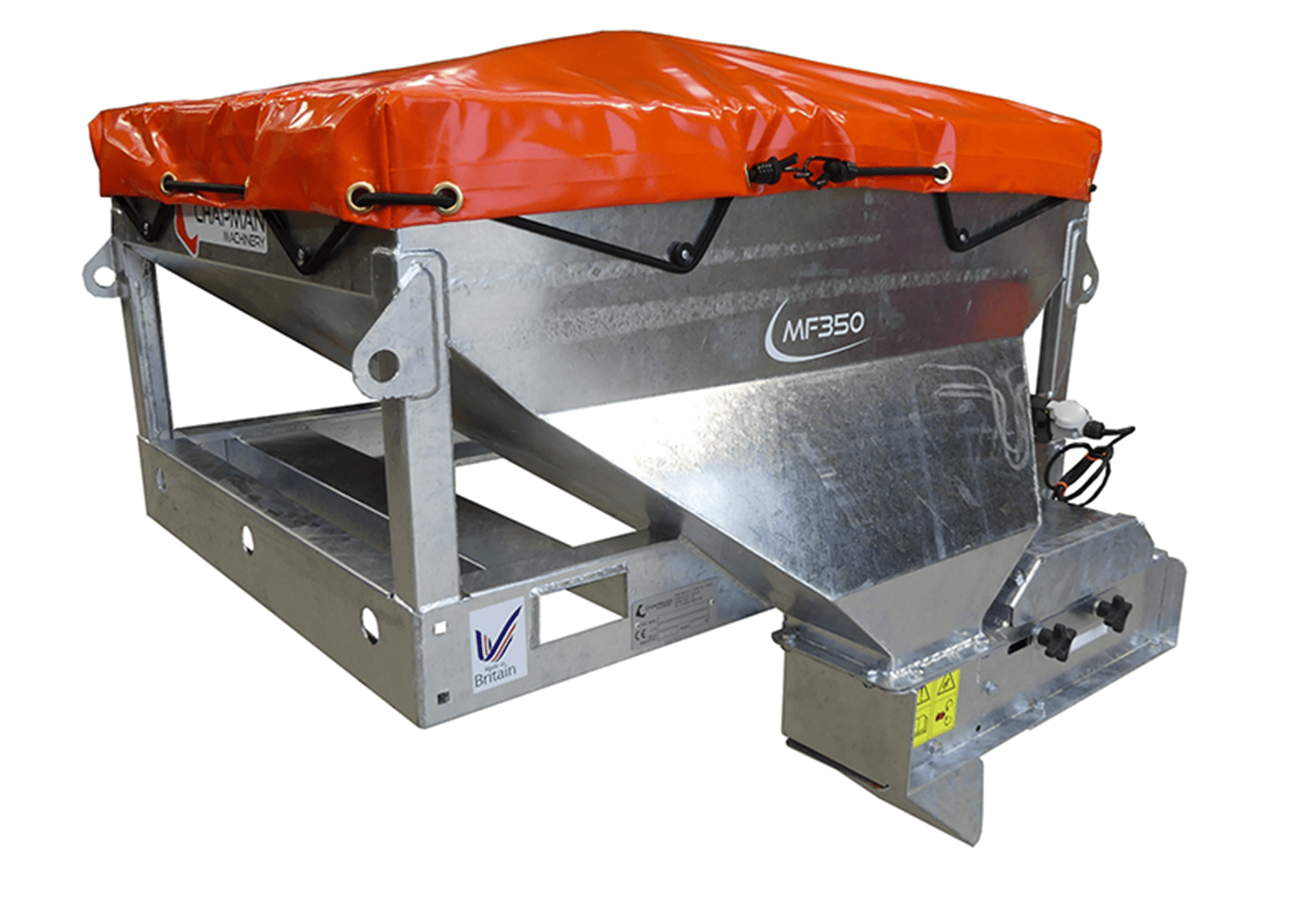 A metal box with an orange tarp on top of it.