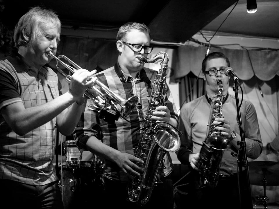 Steve Trigg with the Karla Milton Collective horn section