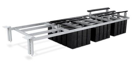 Steel framework supporting black modular storage bins on a white background