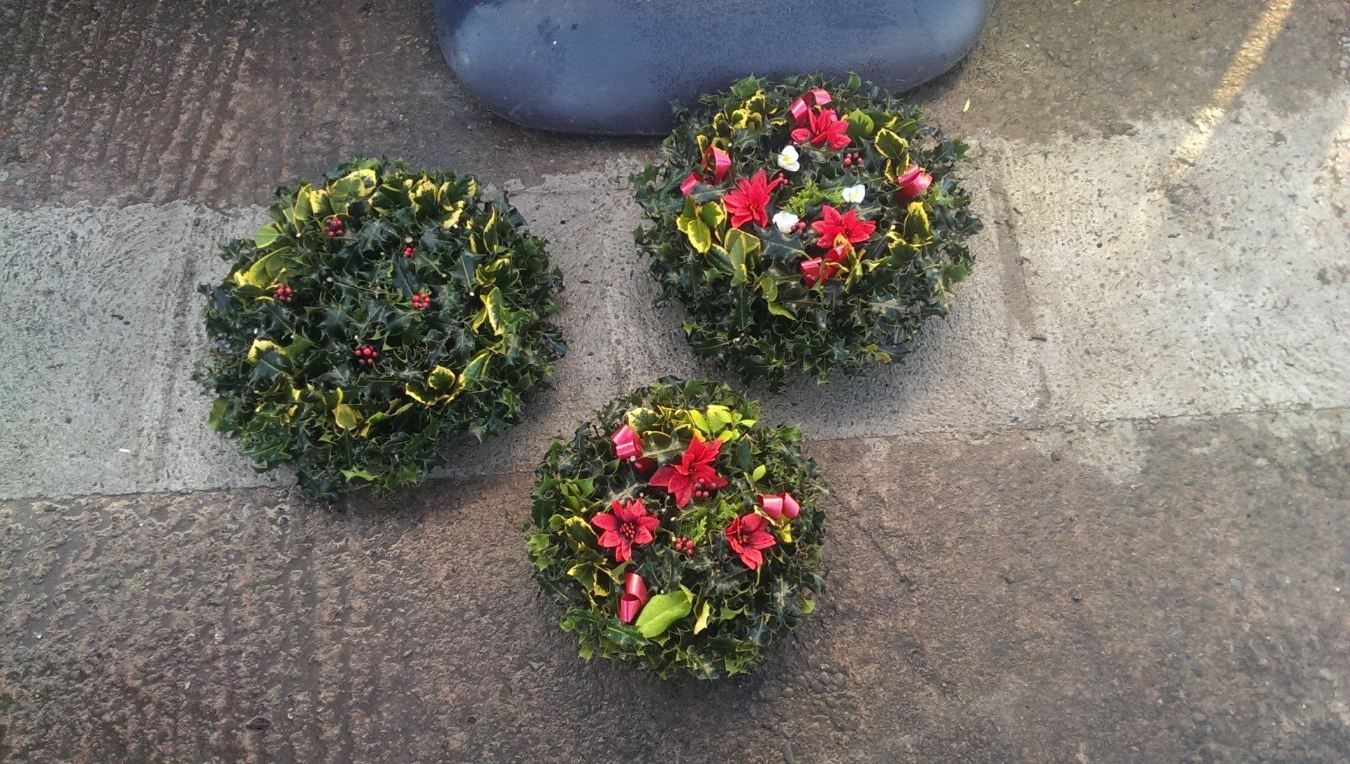 Three decorative Christmas wreaths