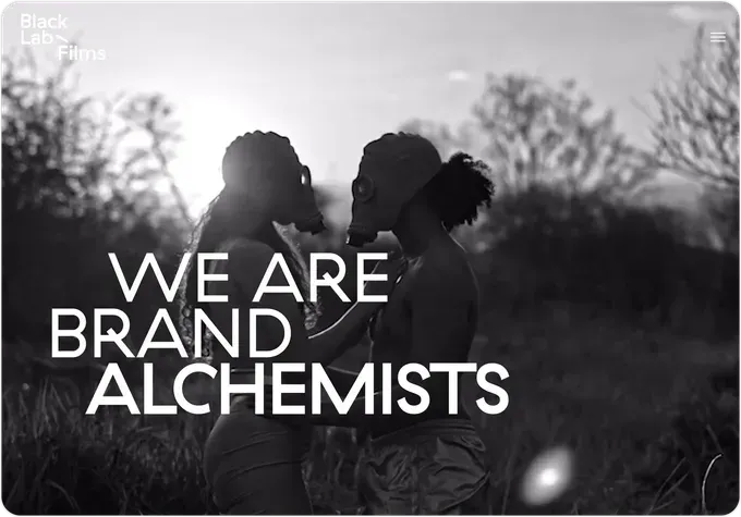 Screen shot of a website where a black and white photo with the words we are brand alchemists