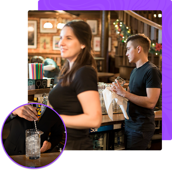 A woman in a black shirt is standing next to a man in a black shirt