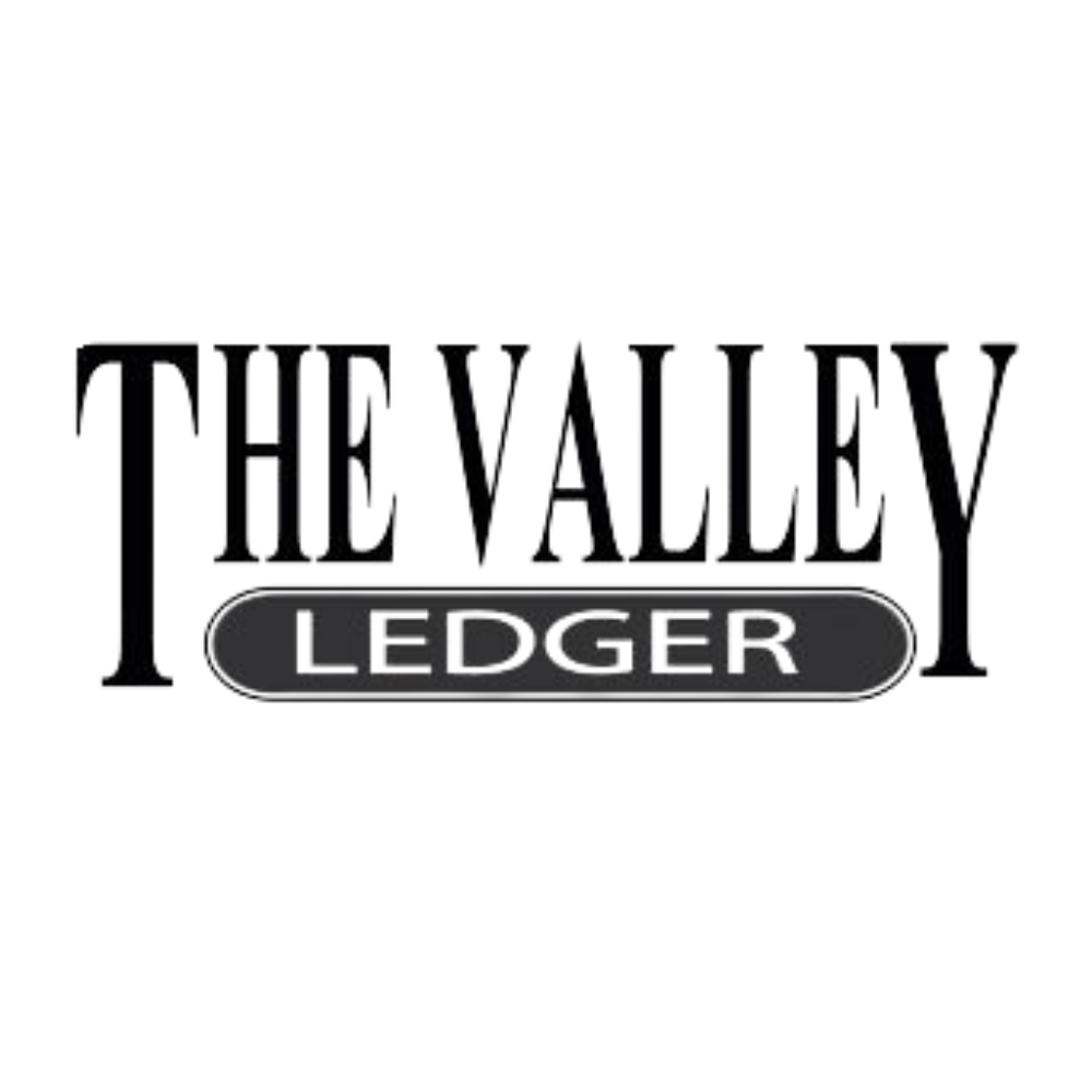 A black and white logo for the valley ledger