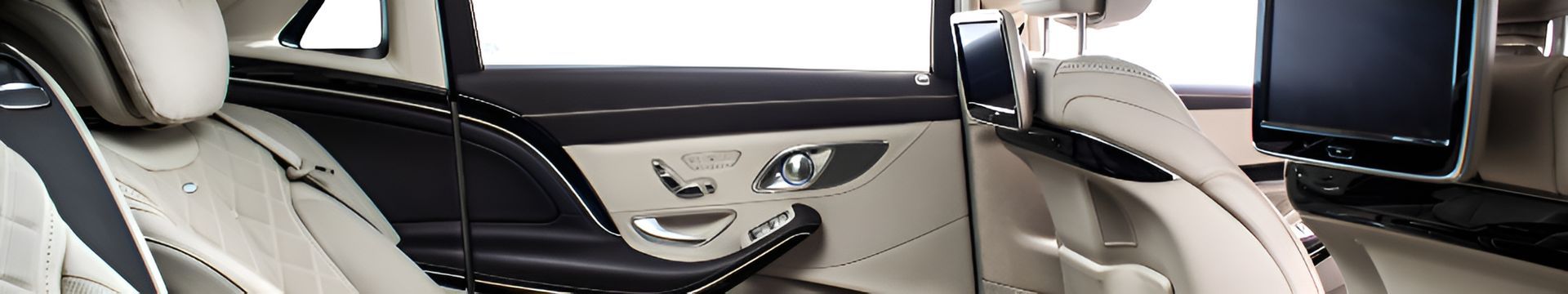 The Interior of a Car With Two Monitors Mounted on the Headrests — Ace Tinting in Mareeba, QLD