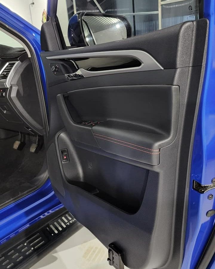 The Inside of a Blue Car With the Door Open — Ace Tinting In Port Douglas, QLD