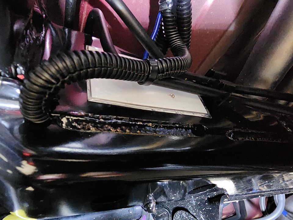 A Bunch of Wires Are Connected to a Car — Ace Tinting In Innisfail, QLD
