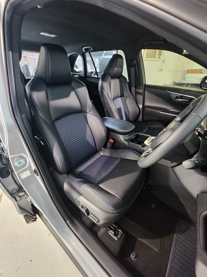 The Interior Of A Car With Black Leather Seats And A Steering Wheel — Ace Tinting In Cairns, QLD