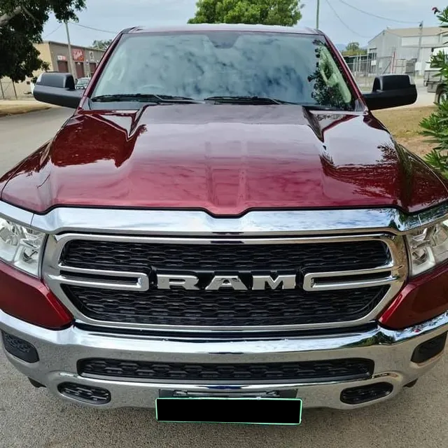 A Red Ram Truck With a License Plate That Says Always Dry — Ace Tinting In Port Douglas, QLD