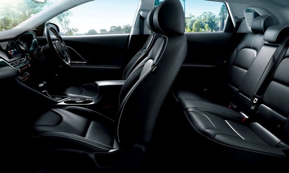 The Interior of a Car With Black Leather Seats and a Steering Wheel — Ace Tinting in Mareeba, QLD