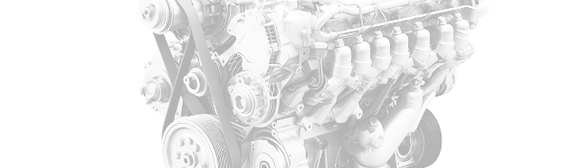 White car engine with exposed timing belt and pulleys, shown in close-up | Integrated Automotive Services