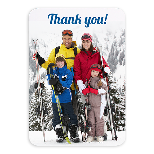 a thank you card with a picture of a family skiing in the snow