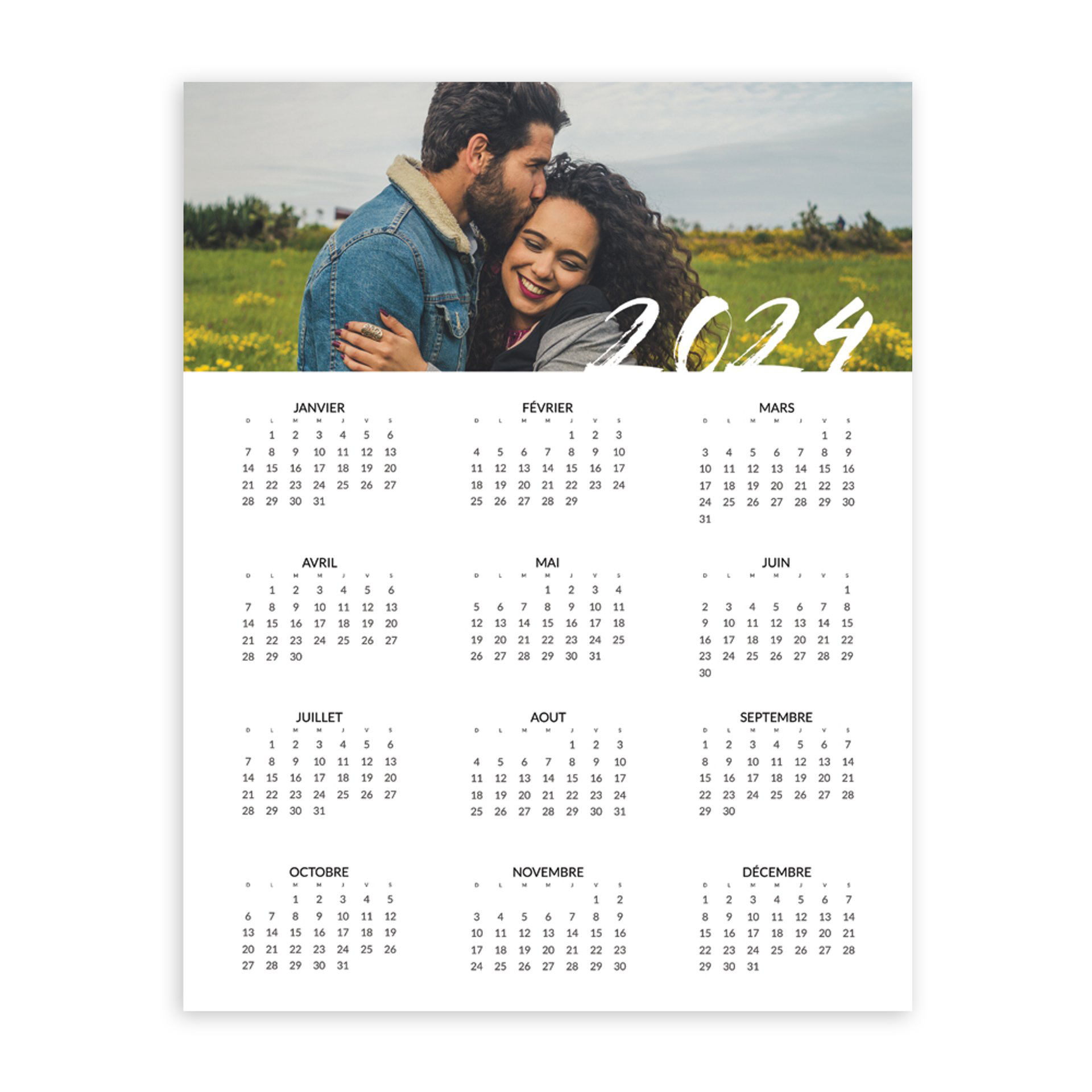 a calendar with a picture of a man and woman on it .