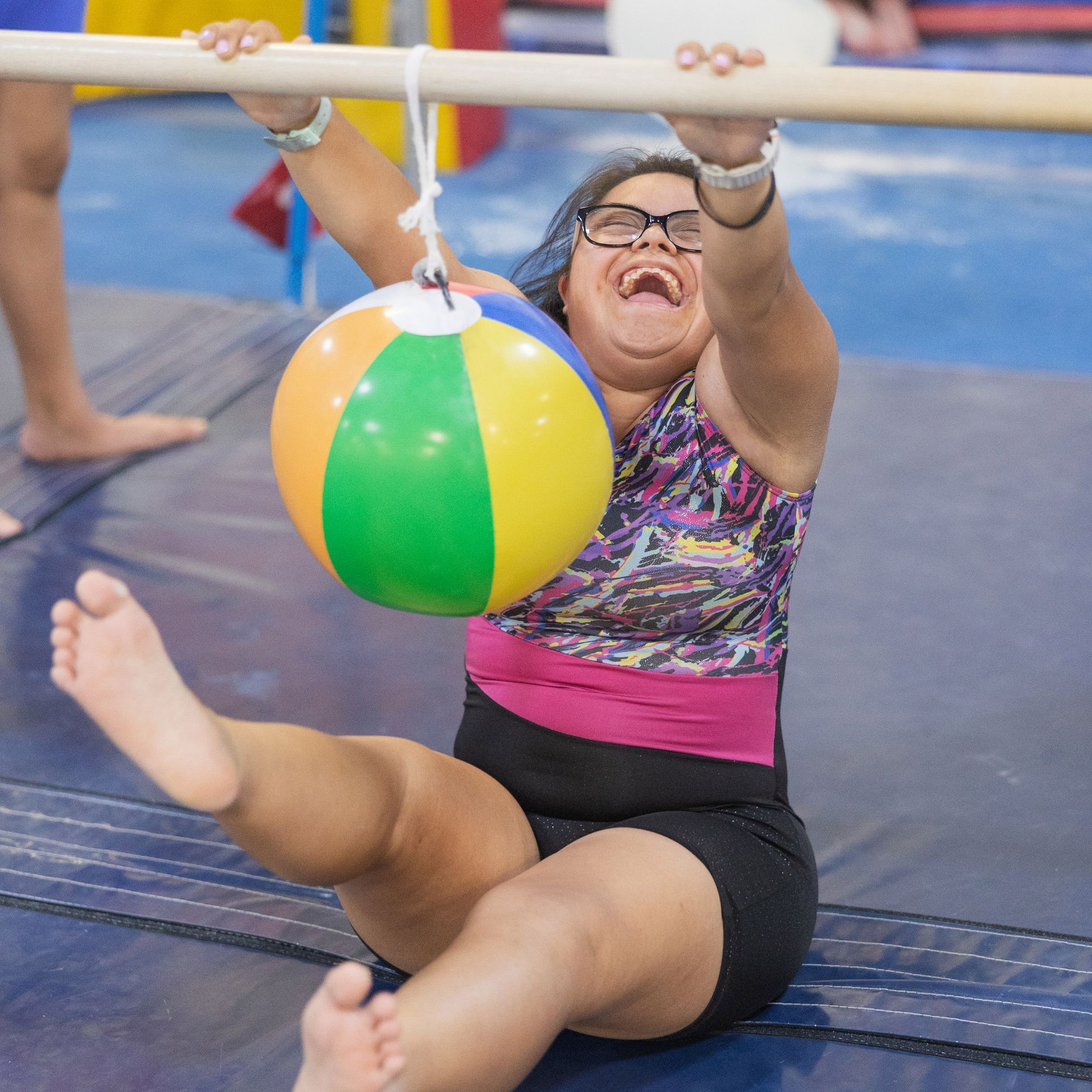 Child playing on gym equipment