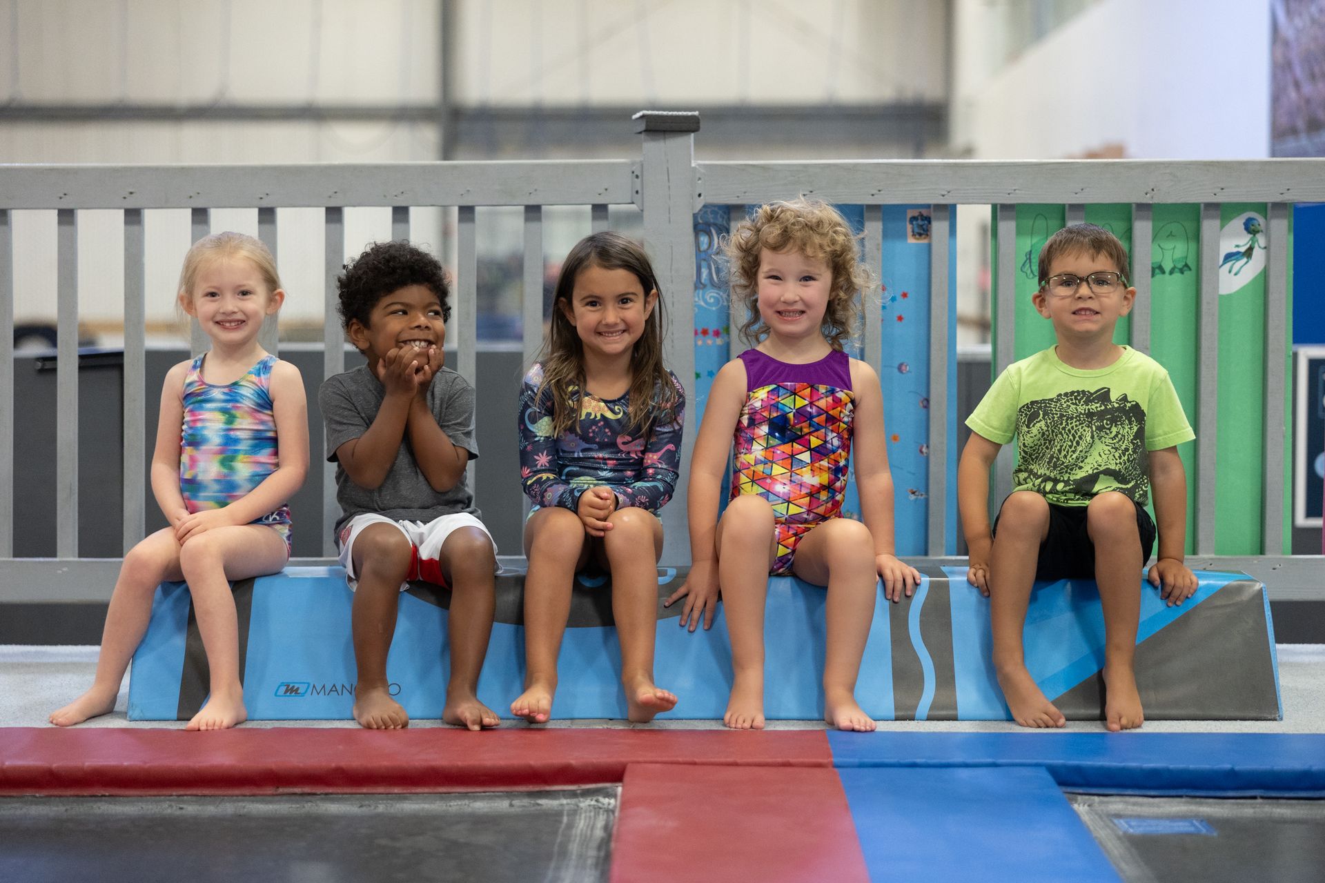 Child playing on gym equipment