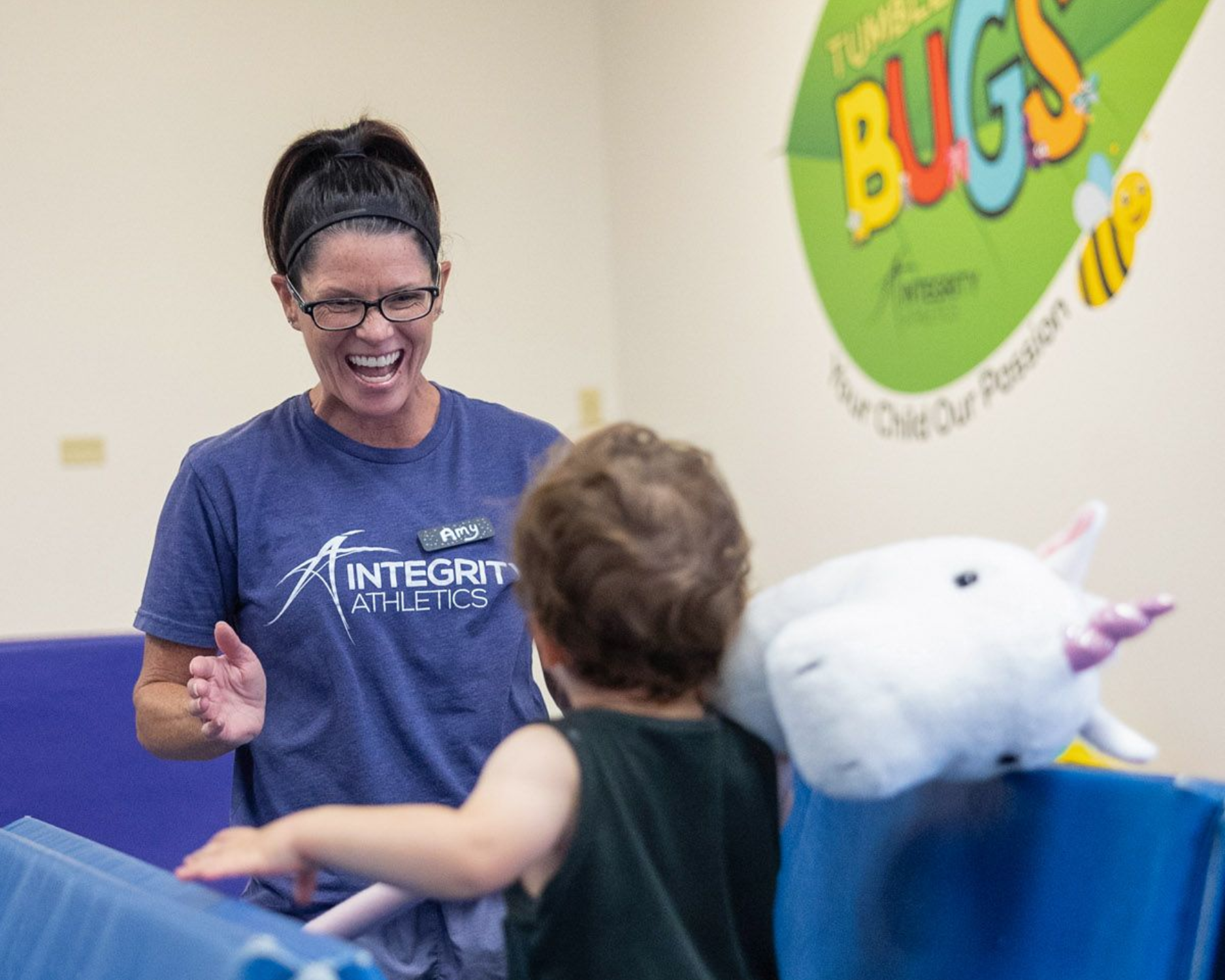 Child playing on gym equipment
