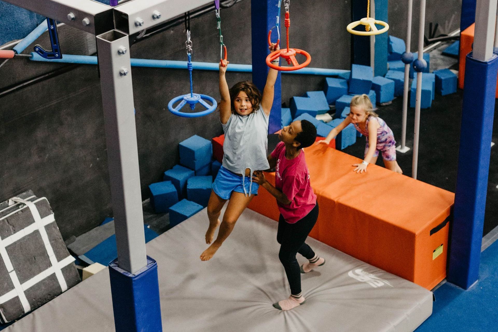 Child playing on gym equipment