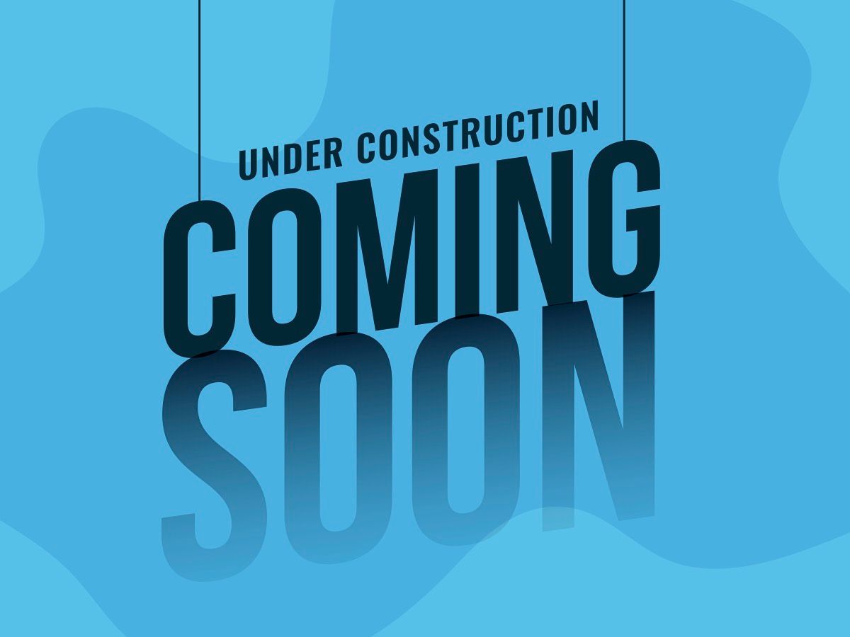 A blue sign that says under construction coming soon