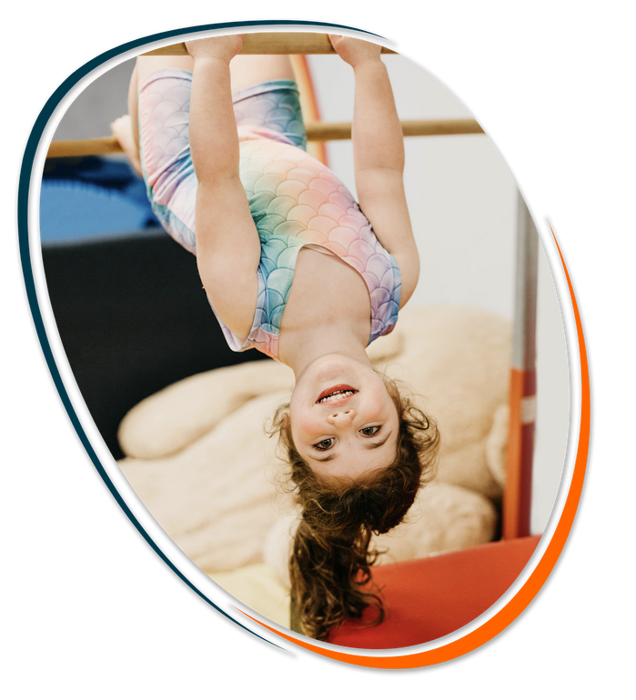 Child playing on gym equipment