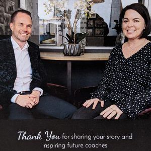 A man and a woman are sitting next to each other