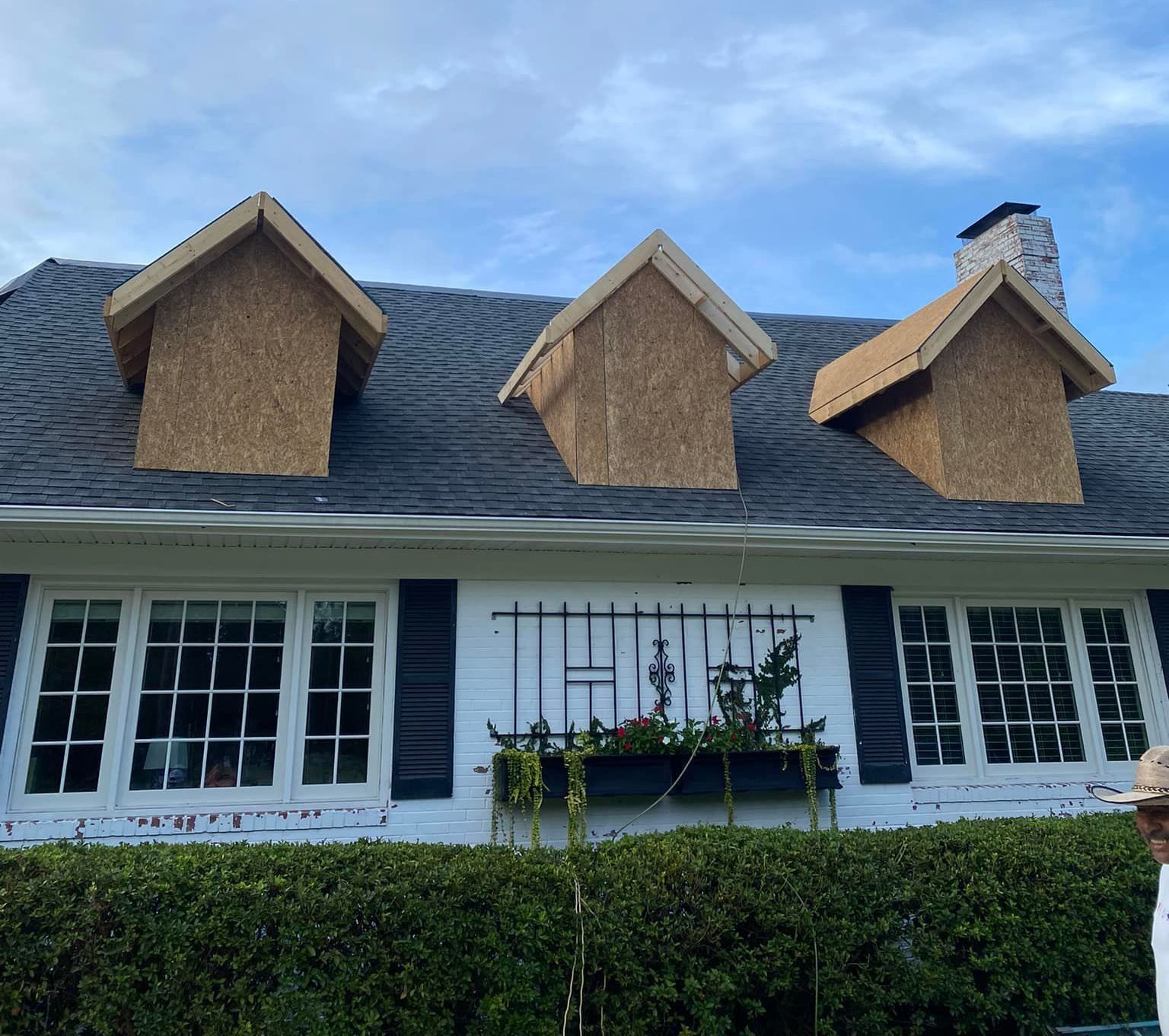 A house that is being built with wooden frames