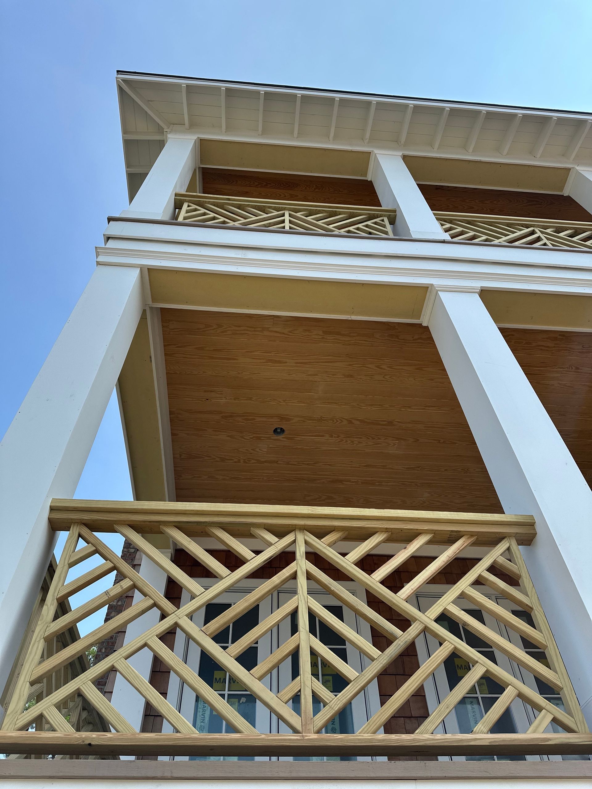 A house that is being built with wooden frames