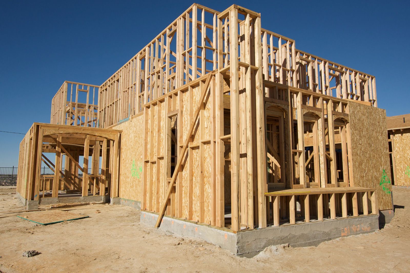 A house that is being built with wooden frames