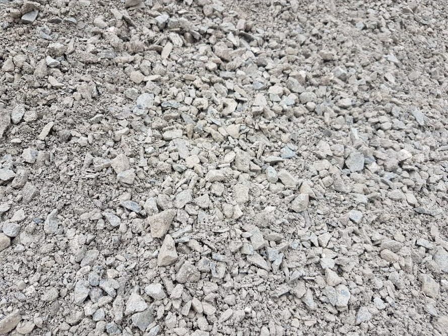 A Pile Of White Gravel Is Sitting On The Ground — Cooroy Landscape Supplies and Garden Centre in Gympie, QLD