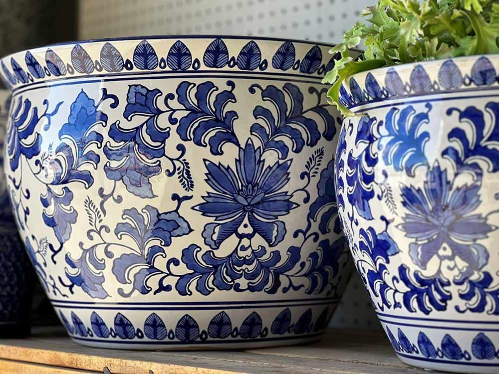 Two Blue And White Pots With Flowers — Cooroy Landscape Supplies and Garden Centre in Noosa, QLD