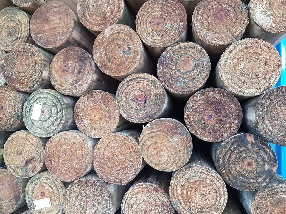 A Pile of Wooden Logs Stacked on Top of Each Other — Cooroy Landscape Supplies and Garden Centre in Cooroy, QLD