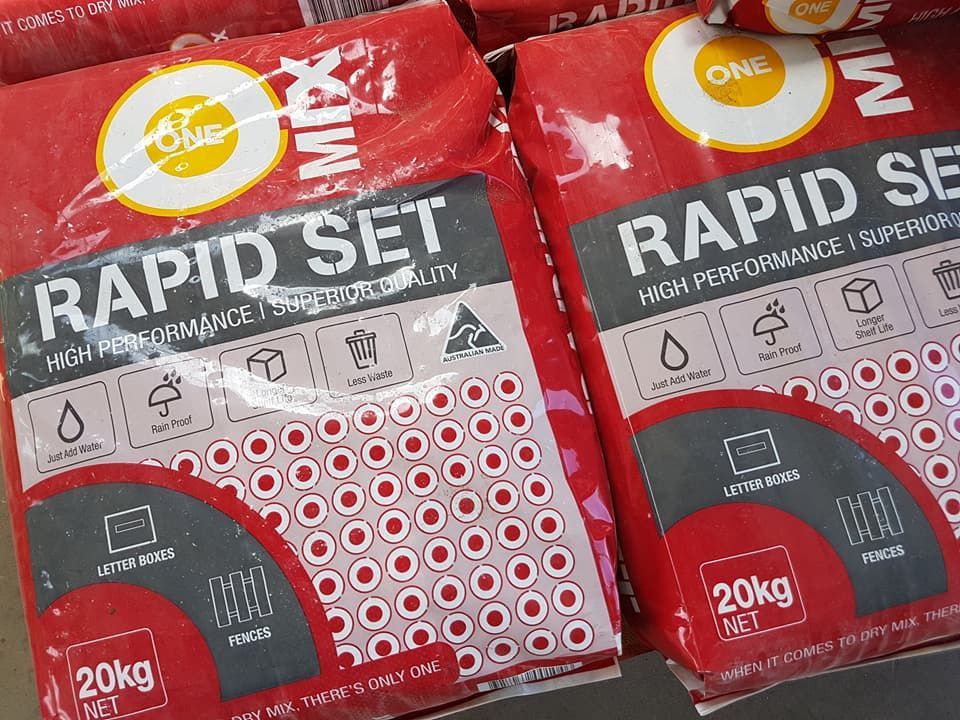 Two Bags Of Rapid Set Are Sitting On A Table — Cooroy Landscape Supplies and Garden Centre in Noosa, QLD