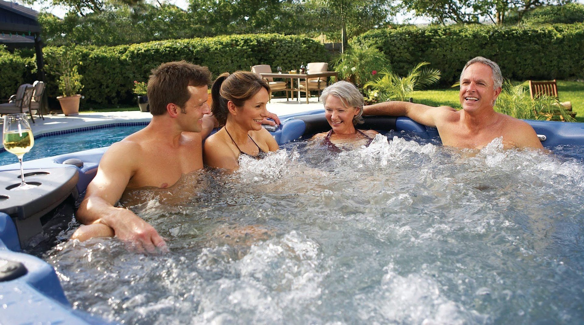 family enjoying hot tub together