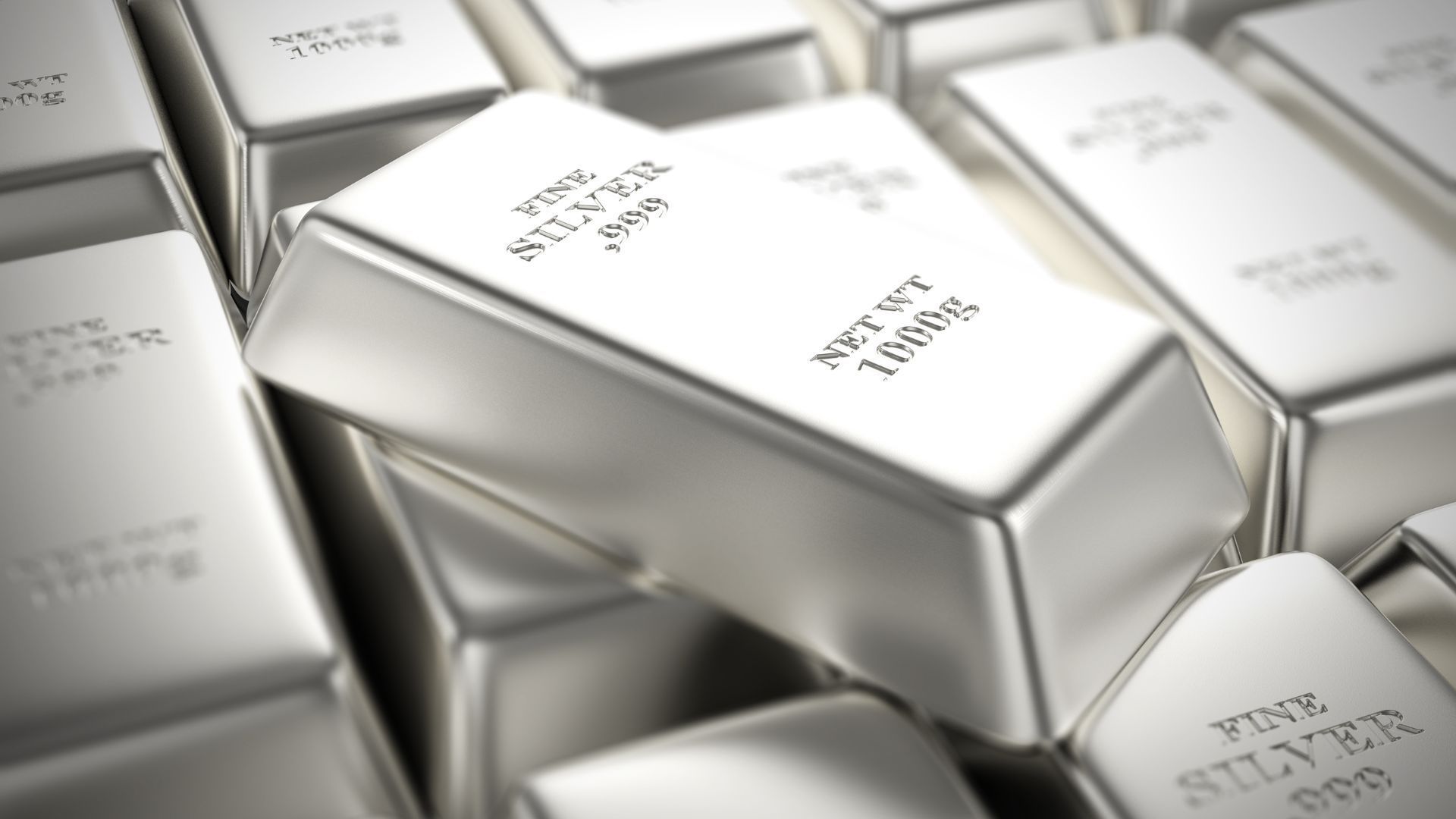 a pile of silver bars stacked on top of each other