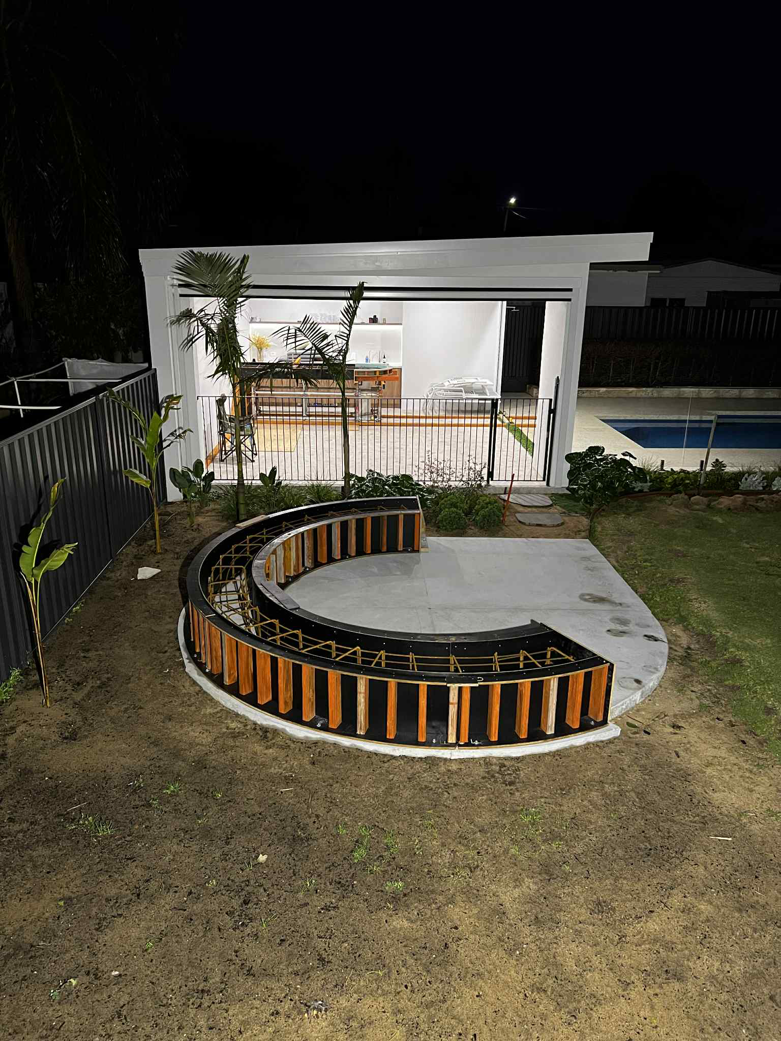Architectural bench seat formwork setup ready for concrete to be poured by Woodlands Construct in Perth homes backyard