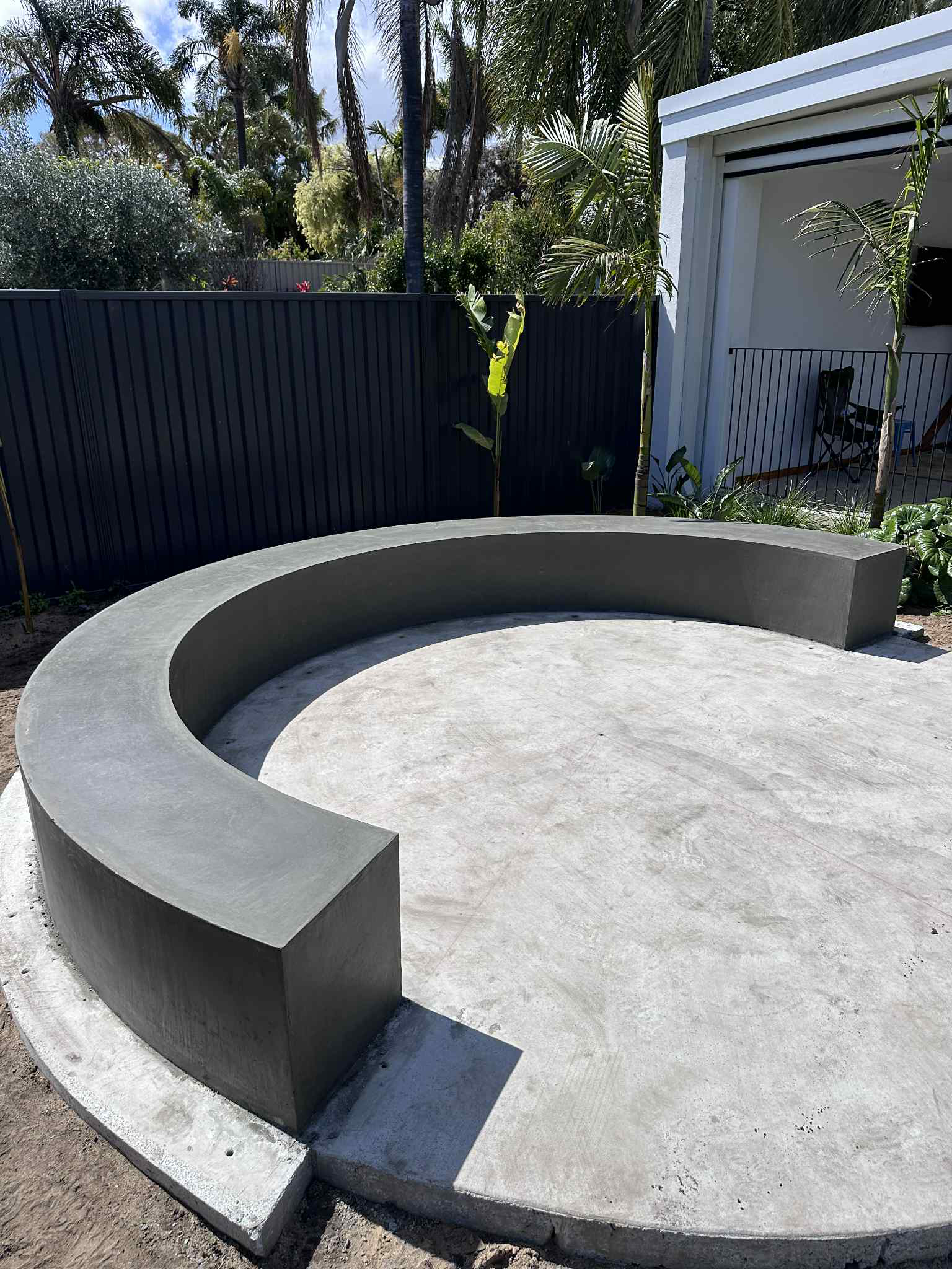 Before concrete sealing on a Perth Architectural concrete bench seat and fire pit