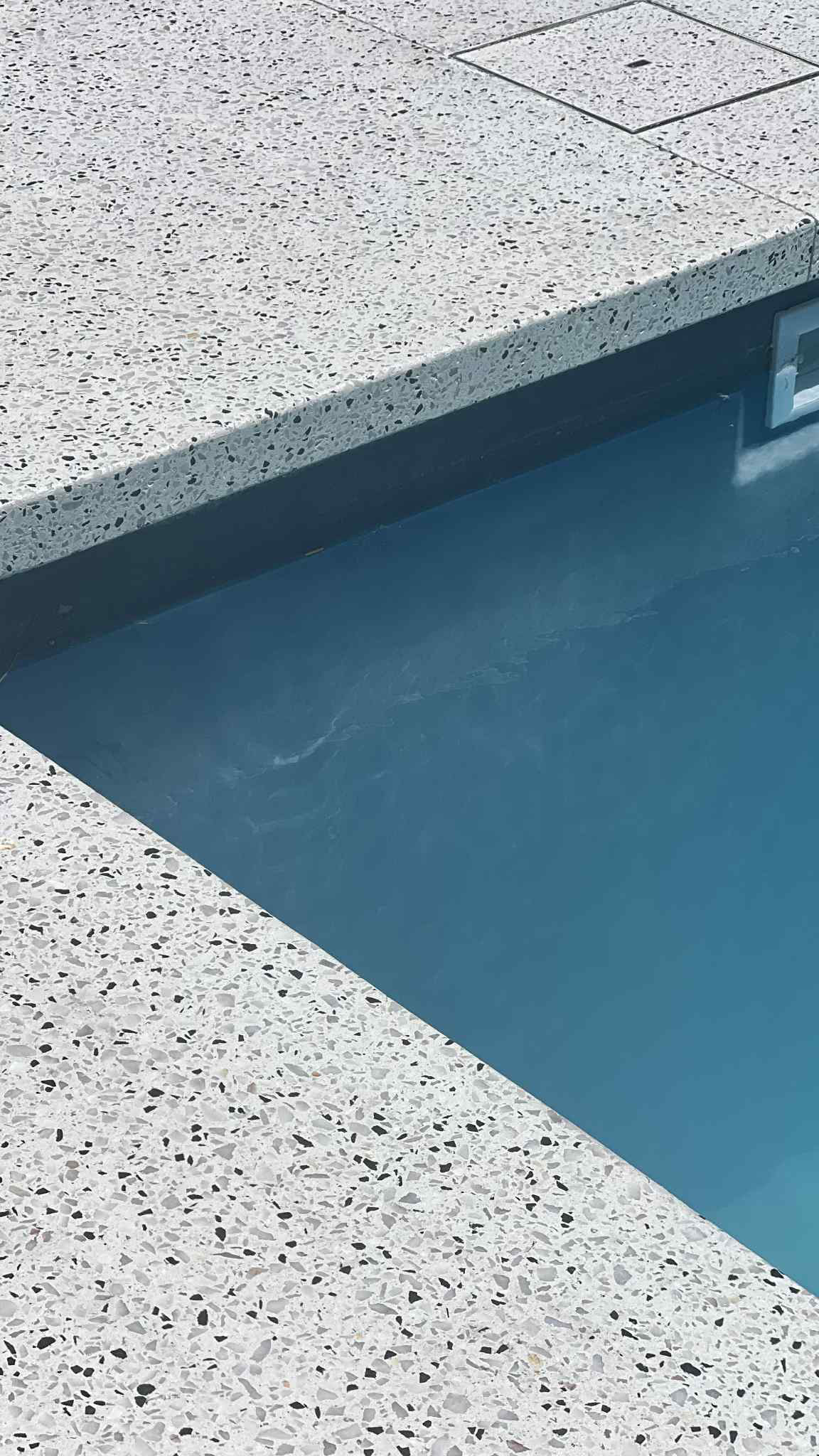 Honed concrete pool surrounds for home in Mindarie