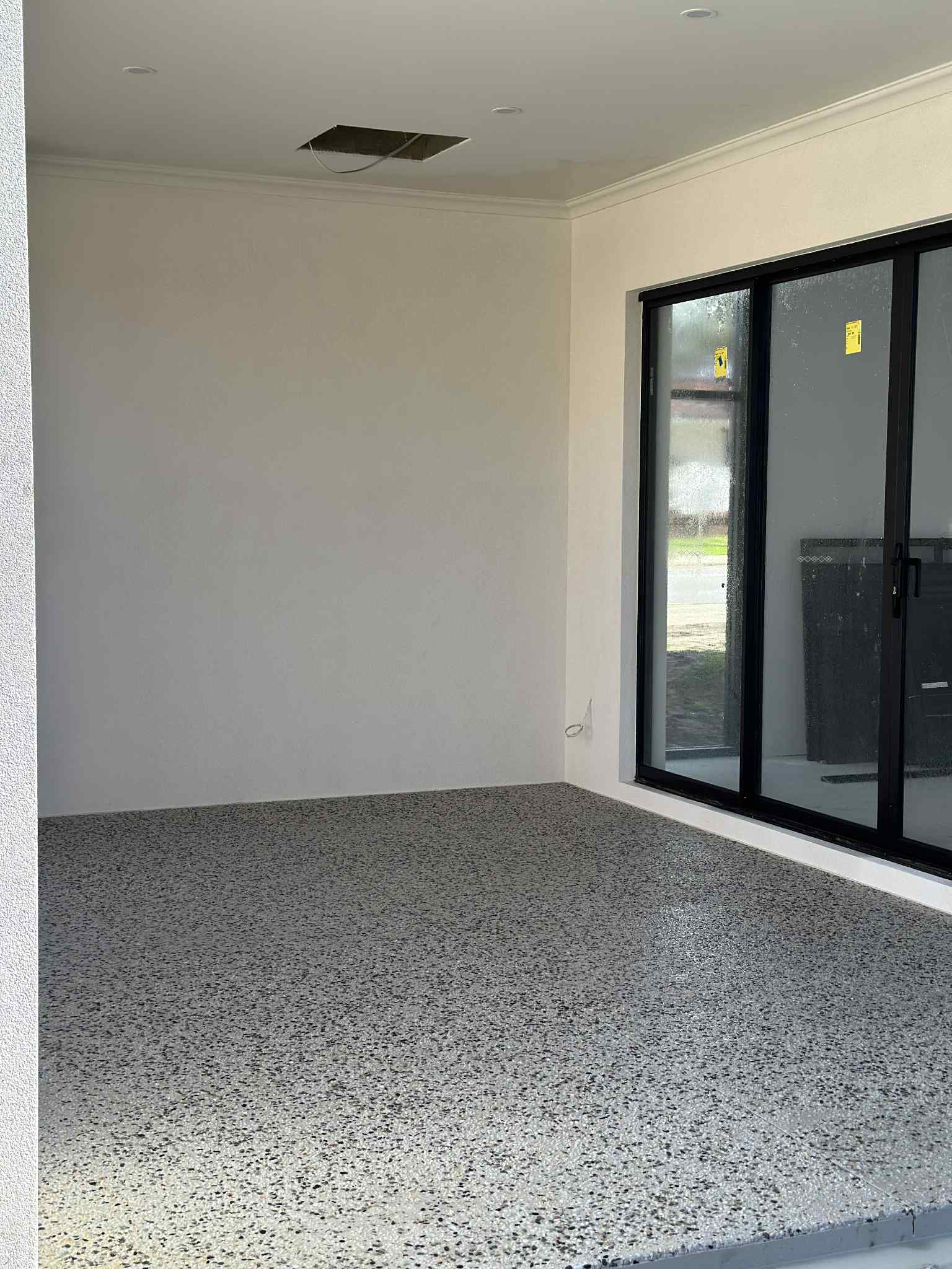 Exposed aggregate concrete patio for small backyard in Perth